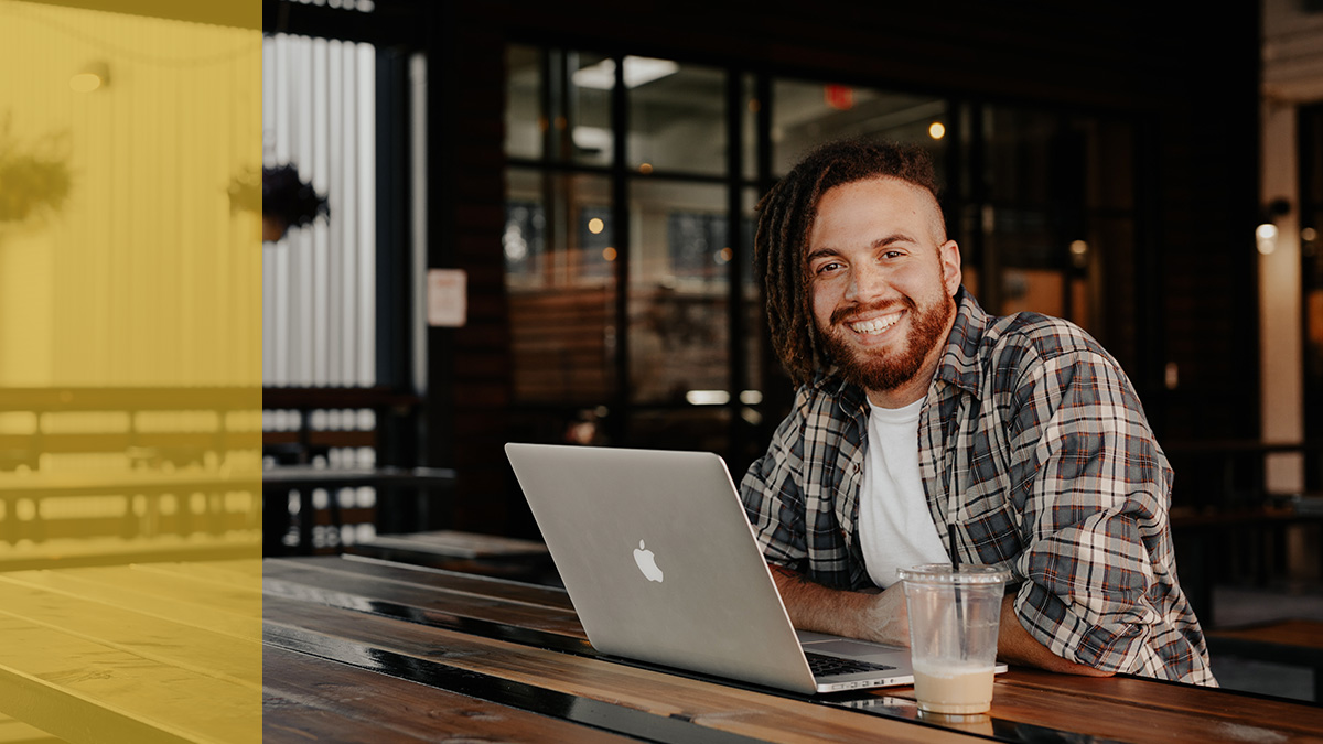 person happy at a computer